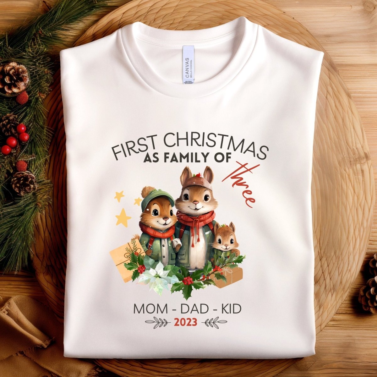 First Christmas as Family of Three - Personalised High Quality Unisex T-Shirt, Cute Custom Tee, First Holiday with Child, Matching Shirt - Everything Pixel