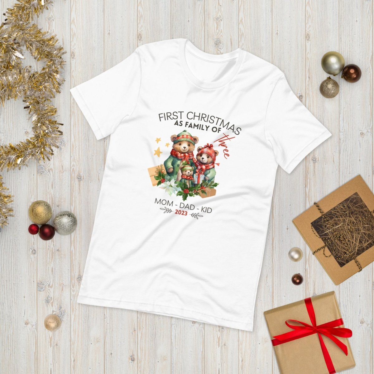 First Christmas as Family of Three - Personalised High Quality Unisex T-Shirt, Cute Custom Tee, First Holiday with Child, Matching Shirt - Everything Pixel