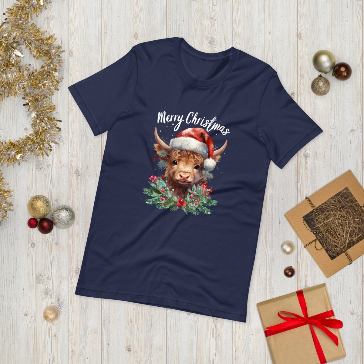 Christmas Highland Cow T-Shirt - High Quality Festive Family Unisex T-Shirts, Gift for Cow Lovers, Cute Christmas Shirt, Cow with Santa Hat - Everything Pixel